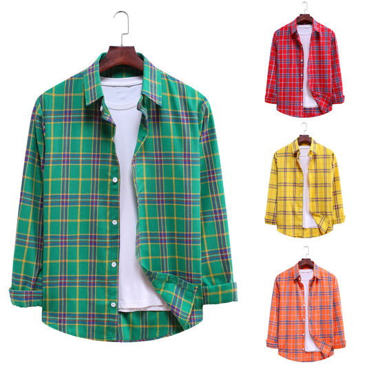 Four plaid shirts in different colors on hangers against a white background.