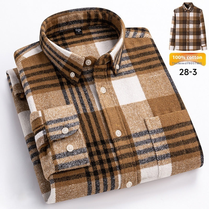 Folded plaid shirt with a label indicating 100% cotton and size 28-3 on a white background.