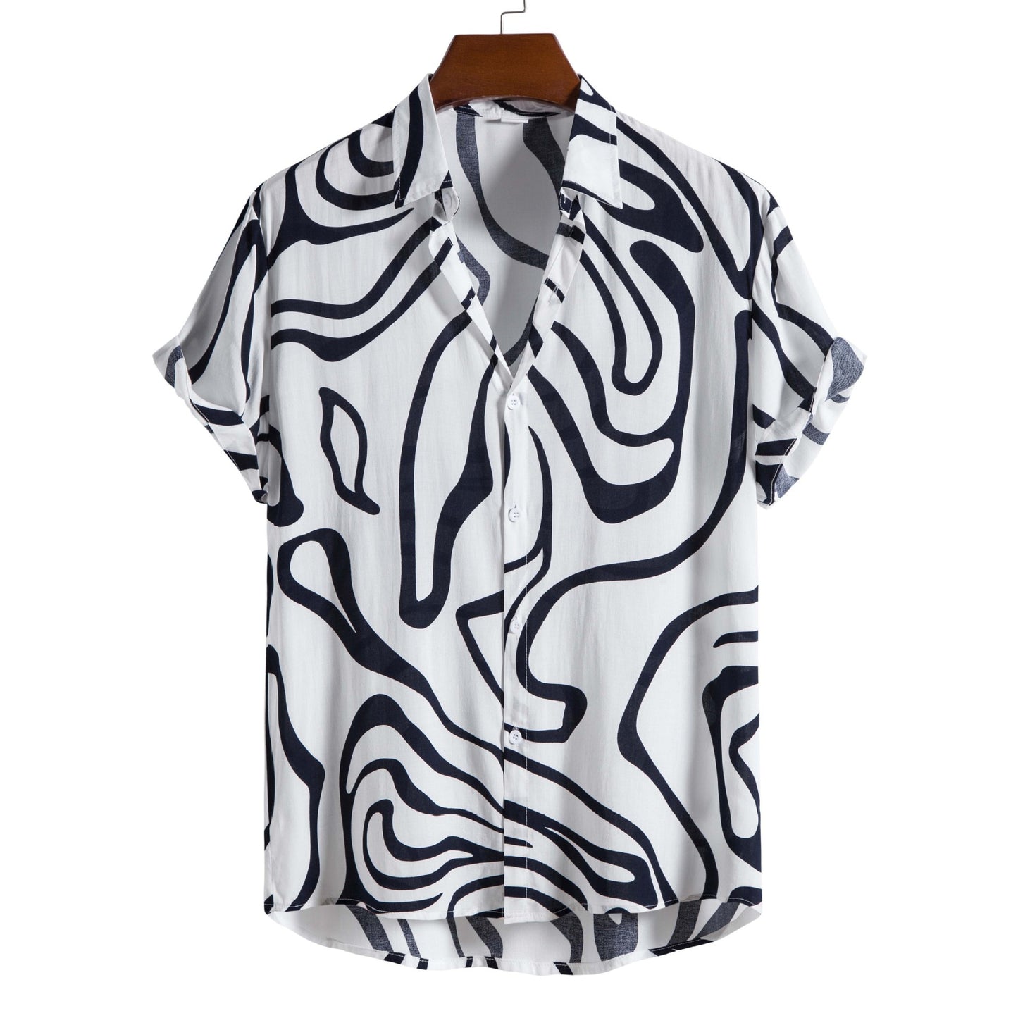 White shirt with black abstract pattern on a hanger against a white background