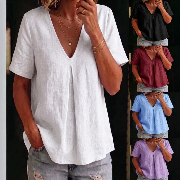 Woman wearing a white linen top with color options displayed.