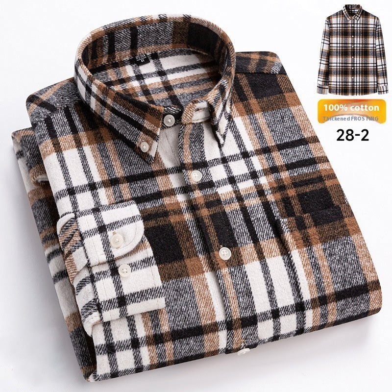 Folded plaid shirt with a label indicating 100% cotton on a white background
