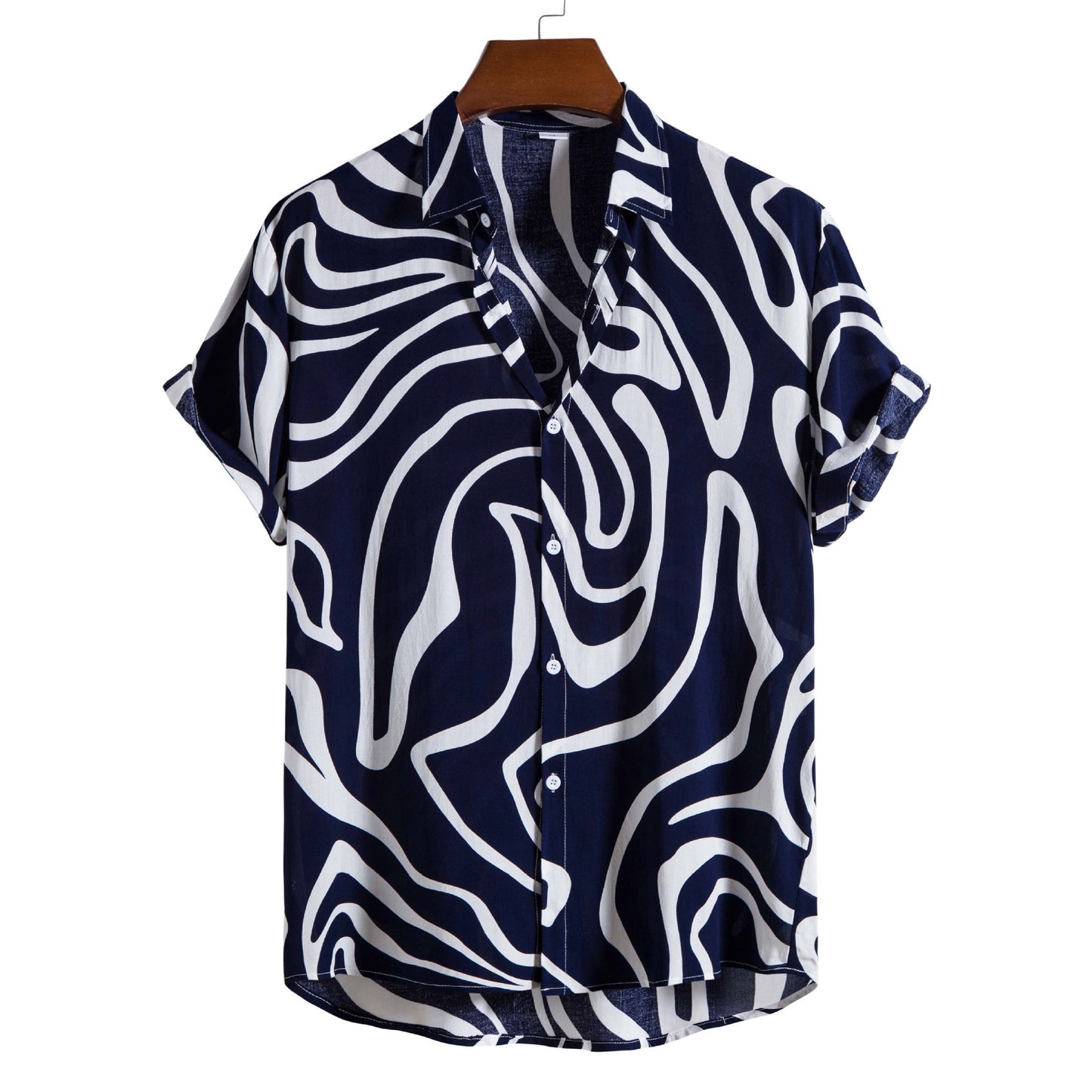 Navy and white patterned shirt on a hanger with a white background