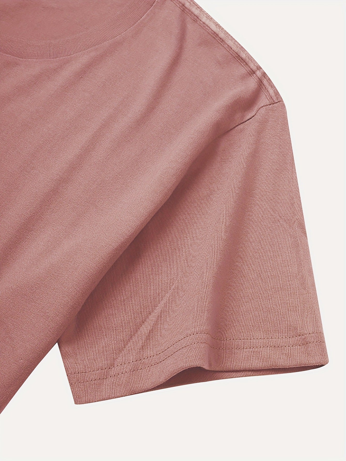 Close-up of a pink fabric texture on a light background