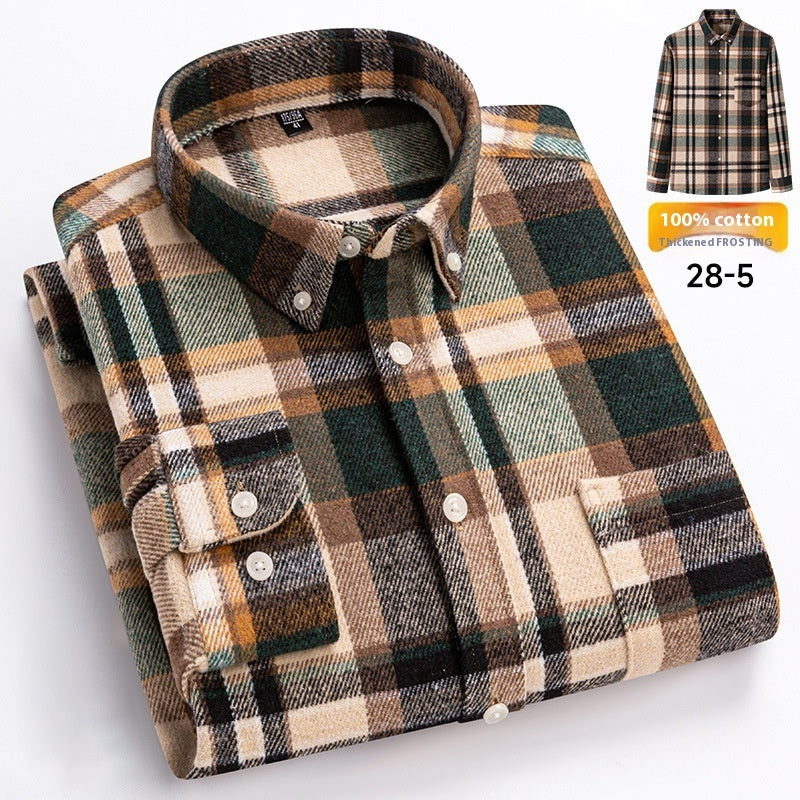 Folded plaid shirt with visible brand label on a white background